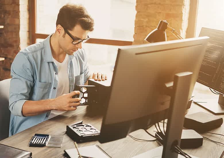 Express PC Pro IT support specialist providing tech assistance in a modern office environment